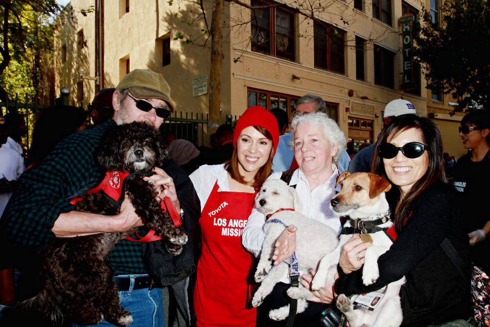 Alyssa Milano;<br>Celebrities Volunteer on Christmas Eve to Serve The Homeless