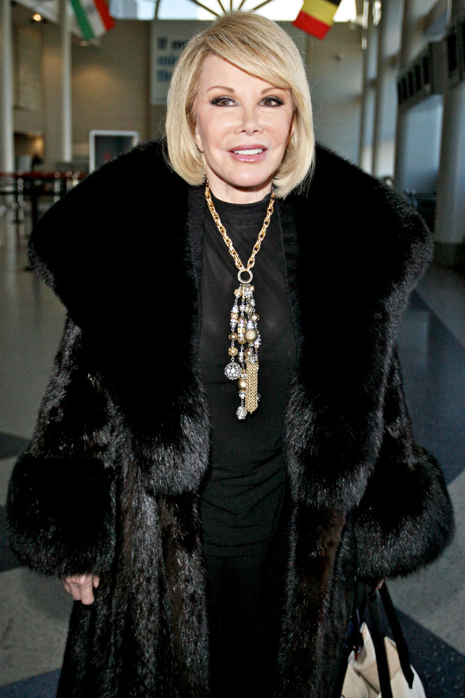 Joan Rivers;<br>Joan Rivers Arriving at LAX Airport with Her Daughter to Catch A Flight
