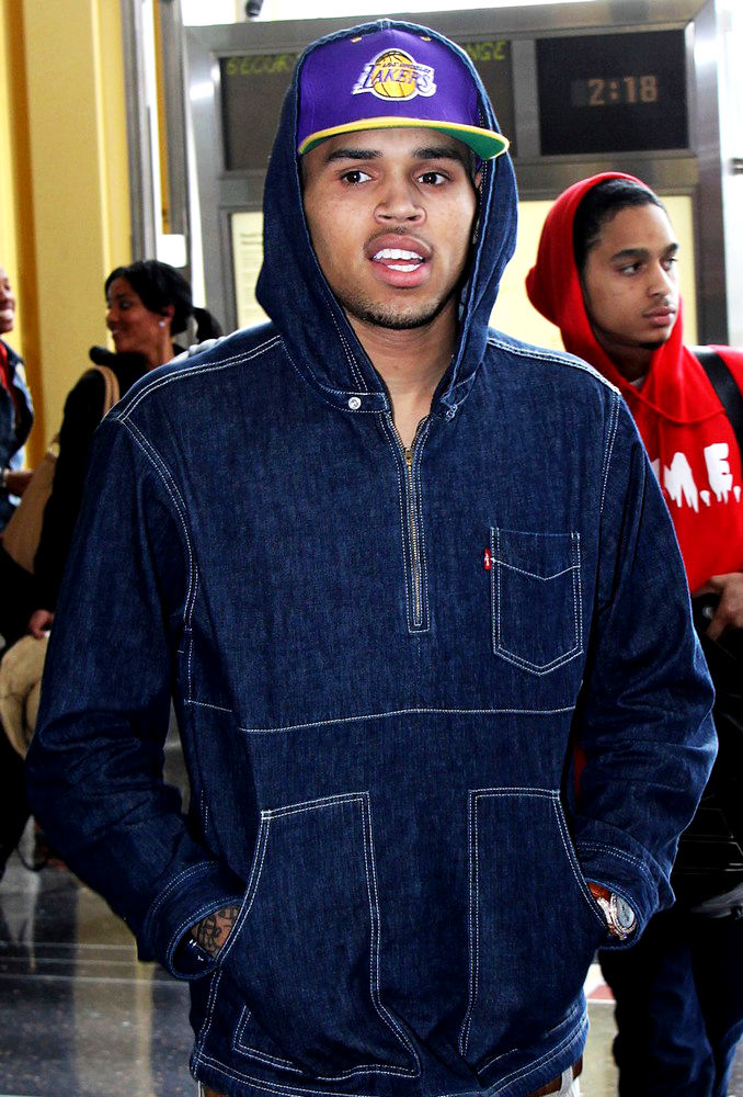 Chris Brown;<br>Chris Brown Arrives at Ronald Reagan National Airport to Promote His New Album 'F.A.M.E.'