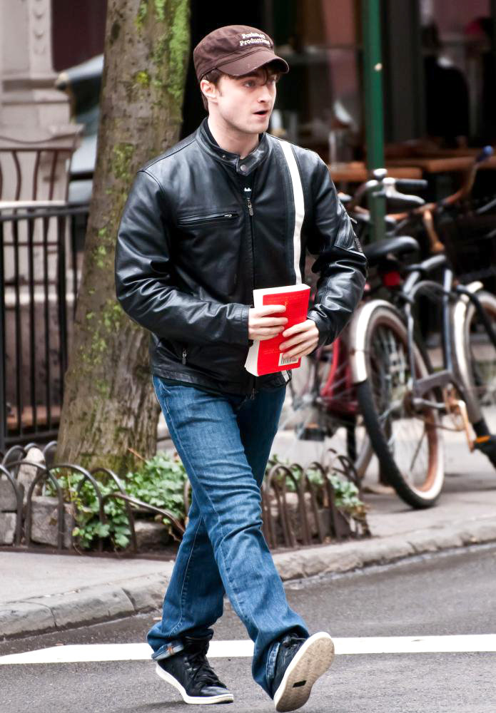 Daniel Radcliffe;<br>Daniel Radcliffe Carrying a Book While Walking in The West Village