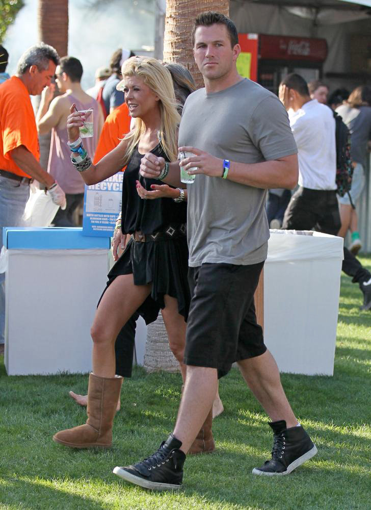 Tara Reid, Doug Reinhardt<br>Celebrities at The 2011 Coachella Valley Music and Arts Festival - Day 1
