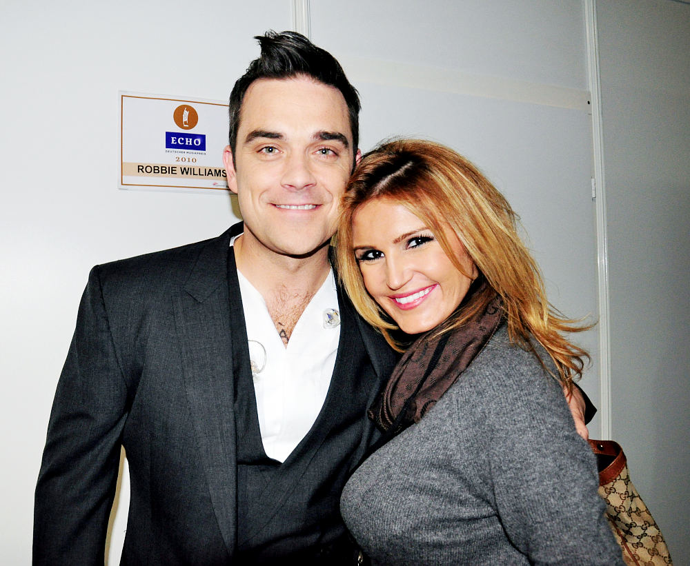 Robbie Williams;Bea Peters;<br>19th Annual Echo Awards 2010 - Red carpet arrivals